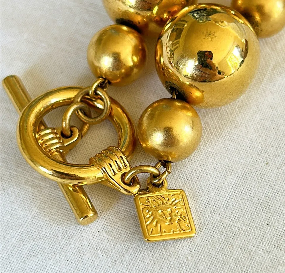 Classic 1980s Ann Klein gold metal beaded designer necklace.